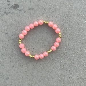 Pink pearl and gold bracelet